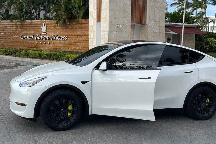 Transfer in Tesla from SDQ Airport to Santo Domingo
